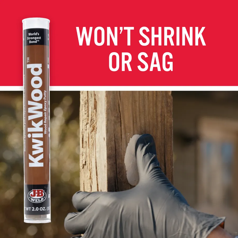 a hand holding a bottle of nail polish