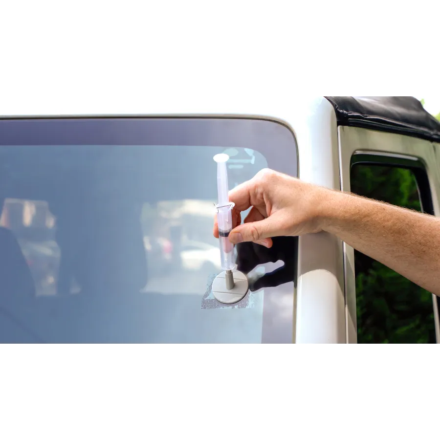 a hand holding a glass of wine