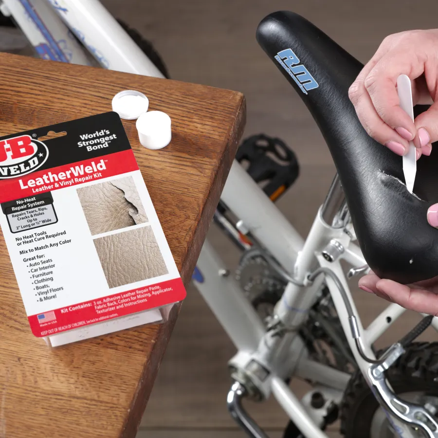 a person holding a bicycle handlebar