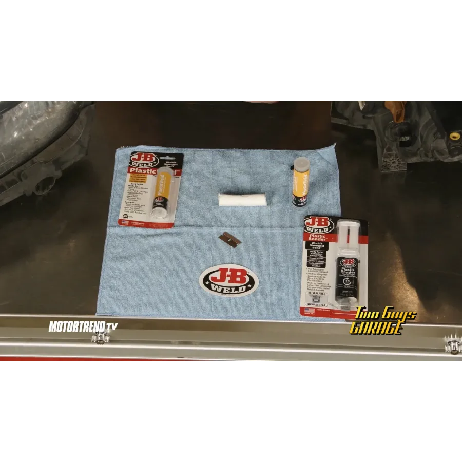 a blue bag with a few bottles of liquid in it