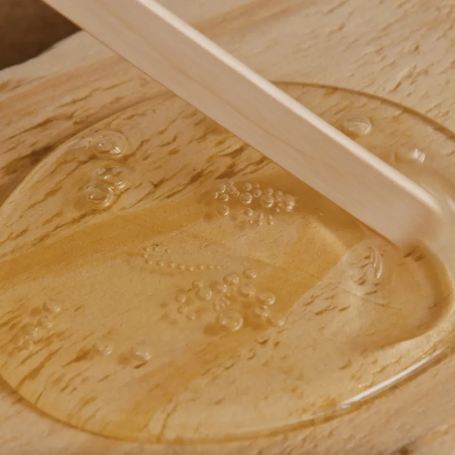 a spoon in a bowl of food