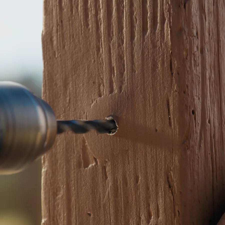 a door handle on a wooden door